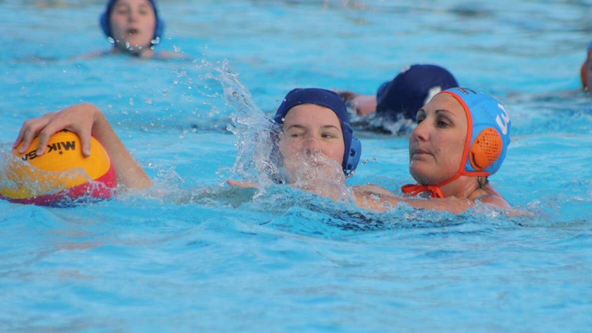 SPLISH, SPLASH: Former Olympian Nikita Williams (right) has been playing in Orange for some time and helping the city's competition develop. Photo: MICHELLE COOK
