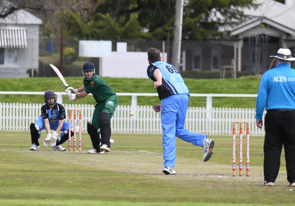Brett Causer loads up against Bathurst City Colts. Picture by Jude Keogh 