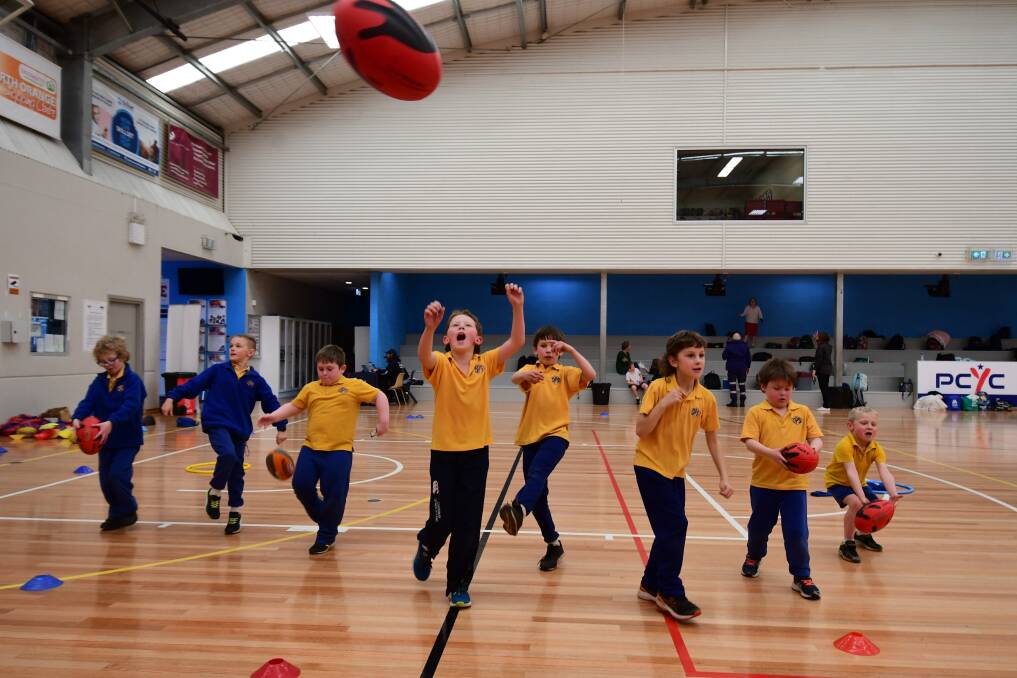 Orange Public School students participate in the Aussie Rules program. Picture by Carla Freedman 