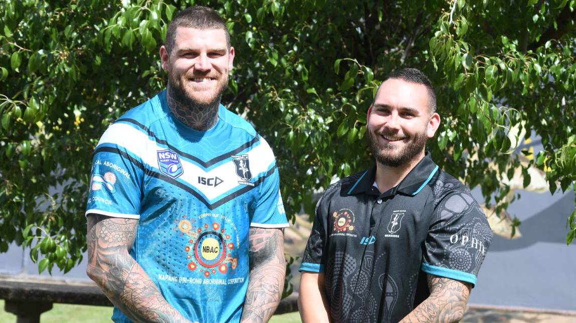 Josh Dugan and Orange United Warriors captain-coach Jake Kelly after the former NRL players signing was announced. Photo: JUDE KEOGH
