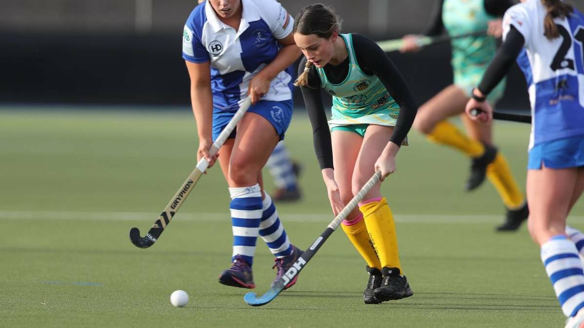 CONCENTRATION: CYMS' Karlee Bell looks to control possession in last year's Central West Premier League Hockey fixture against Bathurst St. Pats. Photo: CHRIS SEABROOK