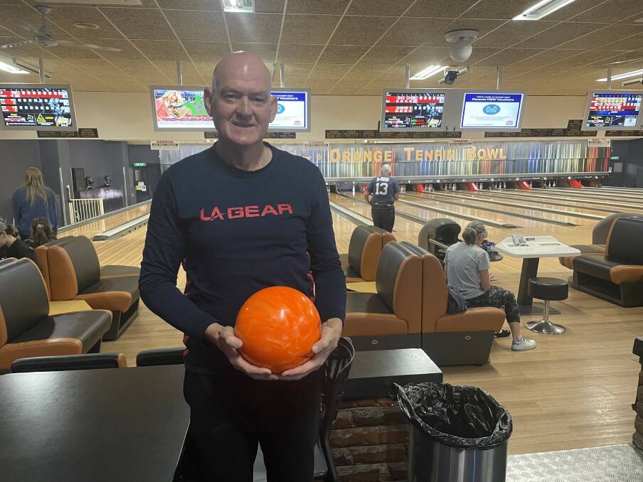 CHAMPION: David Hayward stands in front of lane four at Orange Tenpin where his name is on the honour board. Photo: LACHLAN HARPER 