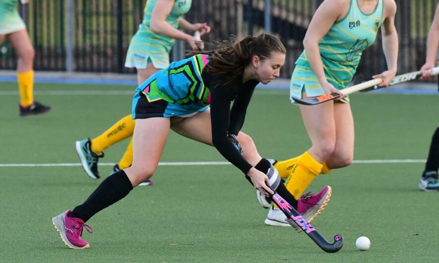 DANGEROUS: Eva Reith-Snare on the attack for her Orange United side. Photo: JUDE KEOGH 