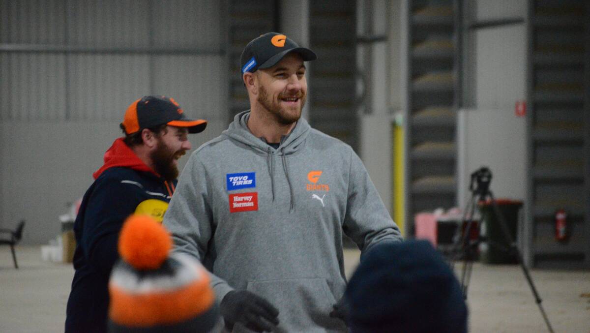 LEGEND: Former AFL star Shane Mumford was all smiles teaching the Central West's brightest Aussie Rules prospects. Photo: LACHLAN HARPER 