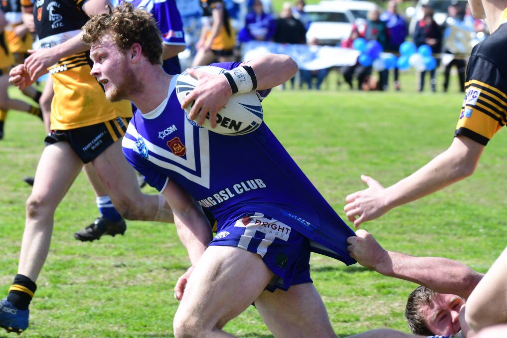 Bailey Peschka looks to break a tackle in the Woodbridge Youth League grand final. Picture by Jude Keogh 