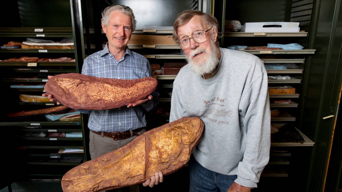 Dr David McGrath, left, bought land in Canowindra rich with 400-million-year-old fish fossils. Paleontologist Dr Alex Ritchie, right, unearthed the now famous site in 1993. Picture: Sitthixay Ditthavong