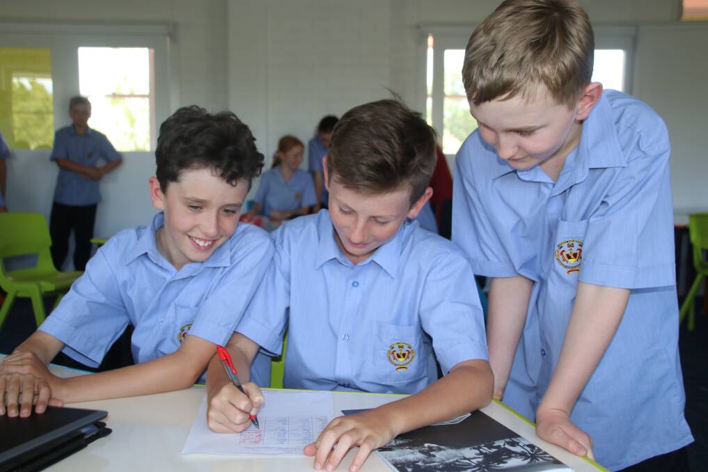 Working together: James Sheahan Catholic High School is focused on ensuring that their school is a place where every student can belong. Photo: Supplied.