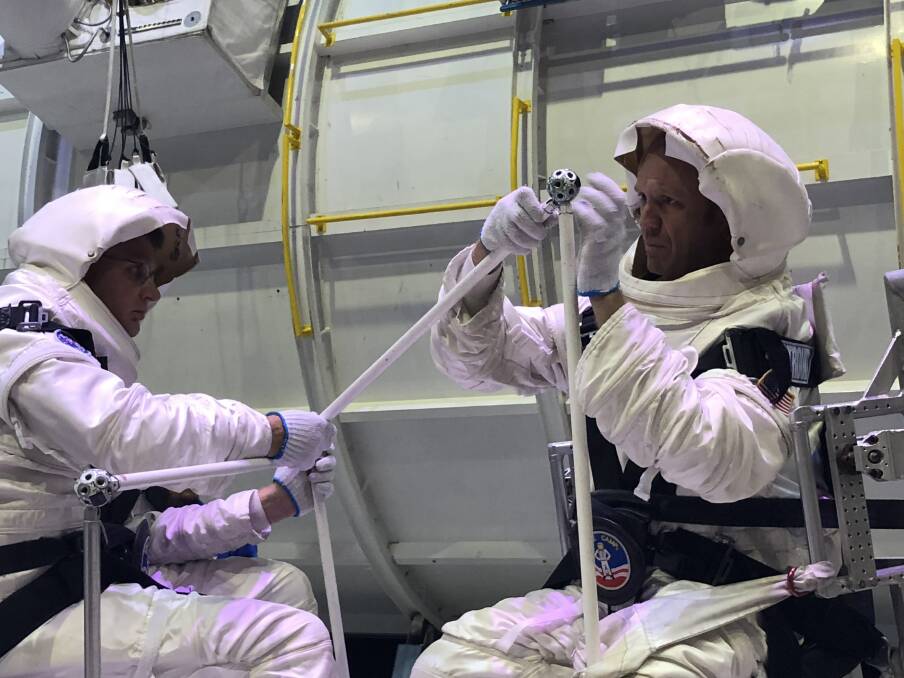 Suit Up: Simple tasks in a space suit can be difficult so something complicated like assembling a radio antenna can cause all sorts of issues. Photo: Supplied.