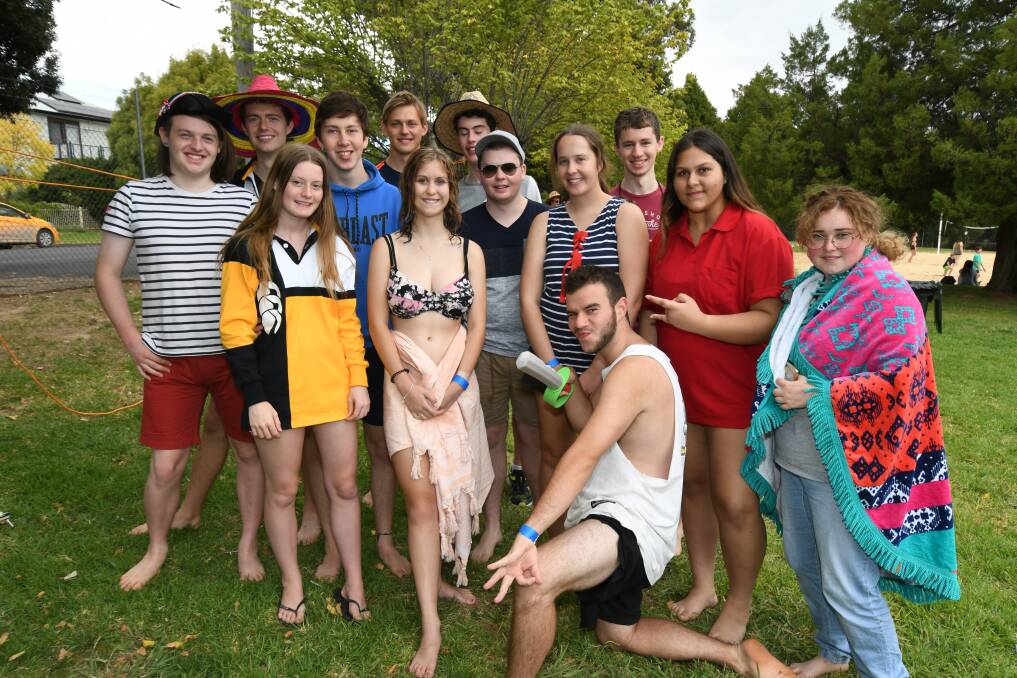 Time for a dip: OHS students Lachlan, Ben, Jake, Harry, Tom, Jack, Zara, Steph, Mitch, Chloe, Sajana, Hannah and Alex at the swimming carnival. Photo: Jude Keogh.