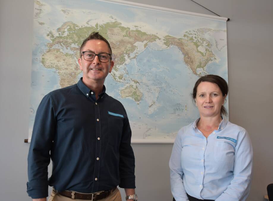 WELCOME REPREAVE: Robert Thornberry and Renee Markwick from Signature Travel Orange said the payments will help local travel agents keep their doors open. Image: Jude Keogh.