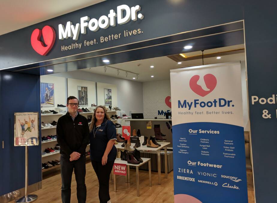 Standing Strong: Orange Podiatrist Chris Lofts and Branch Manager Tracy Inwood are ready to help you address your health needs. Photo: David Radel.
