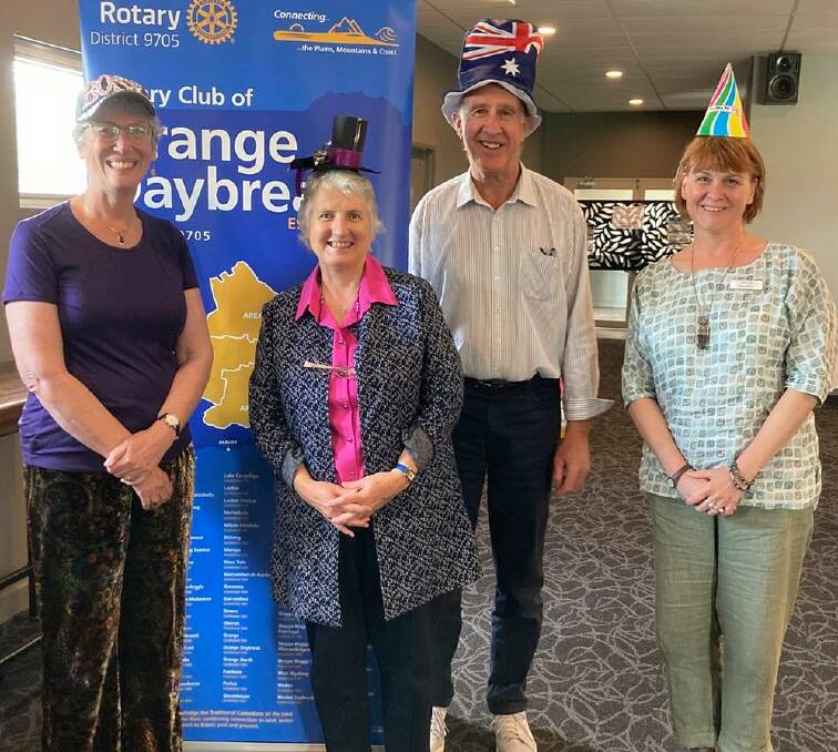 HATS OFF: (Left-to-right) Rotary Club of Orange Daybreak president Sue Moffatt, Bev Rankin and Malcolm Rankin from Fusion Orange; and Ruth Myers from Step By Step Bushfire Recovery at Gateway Family Services. PHOTO: SUPPLIED