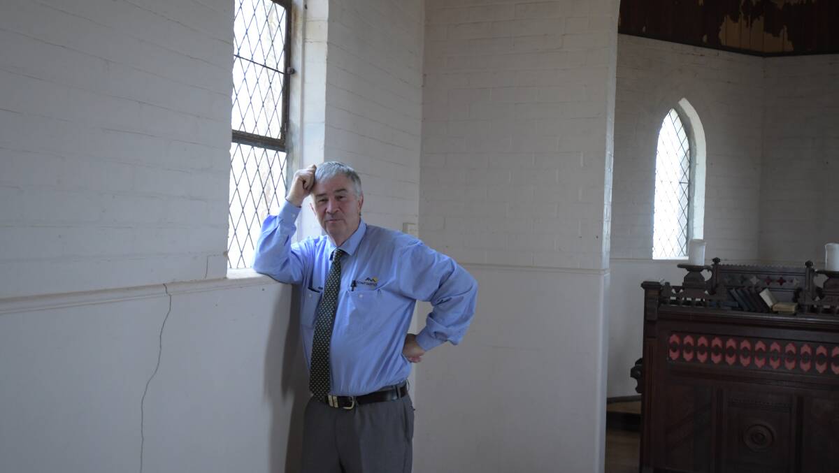 UNIQUE FIND: Real estate agent Stephen Townsend is expecting the former Anglican church to sell for $350,000. PHOTO: ALANA CALVERT