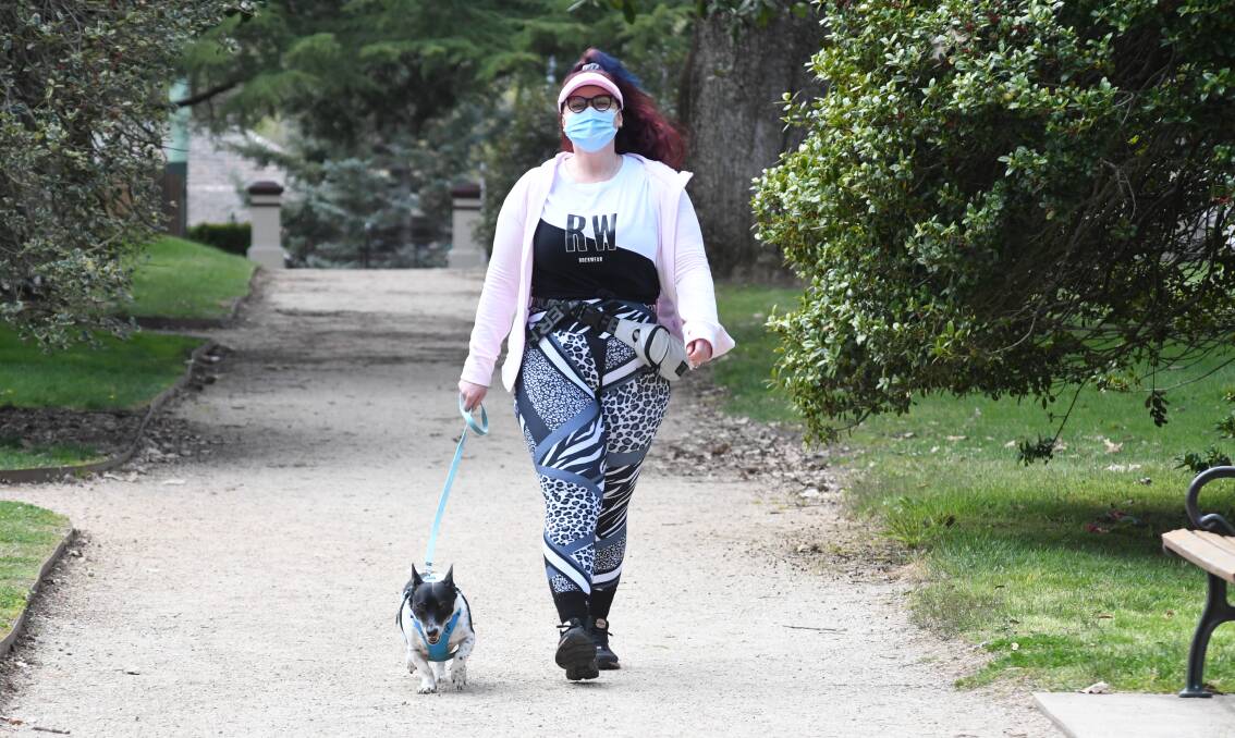 WORTHY WALK: Siobhan Fitzpatrick and her Jack Russell Woodie are walking 100km to raise money for the Black Dog Institue. PHOTO: JUDE KEOGH