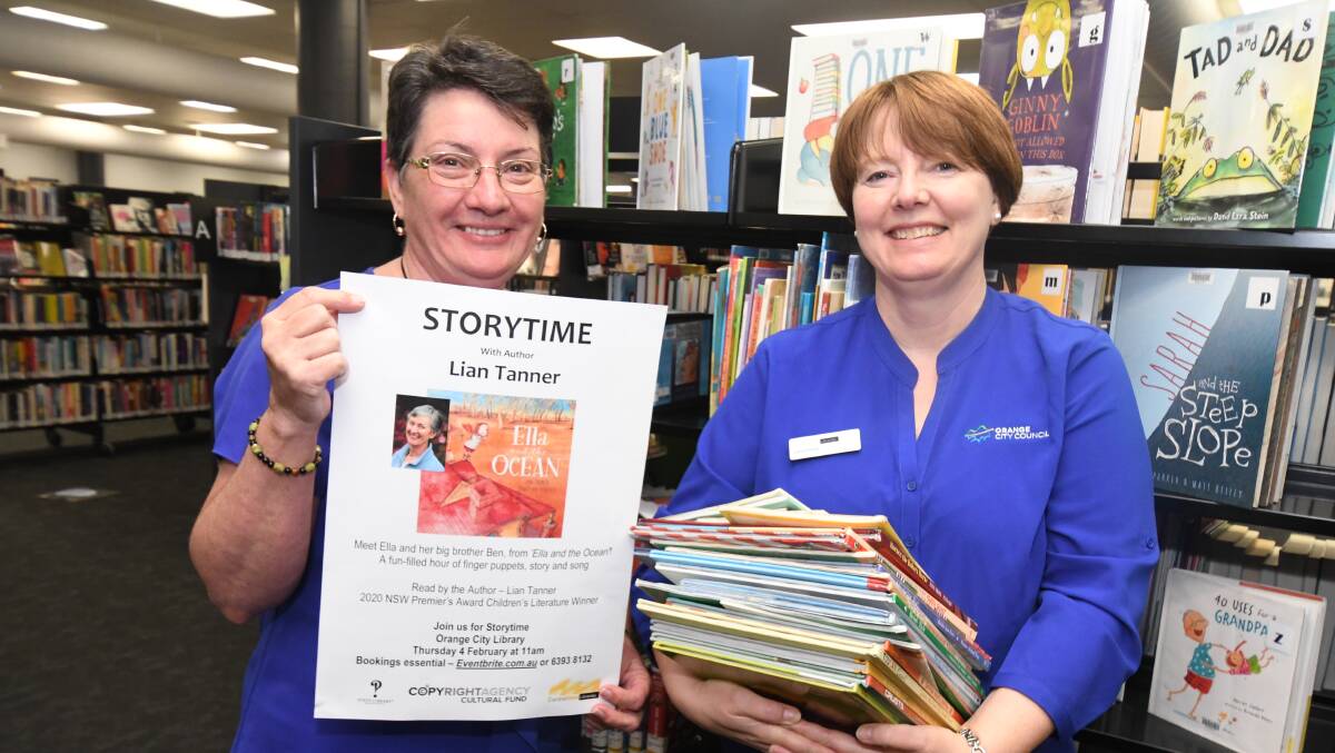 TALL TALES: Orange librarians Julie Sykes and Jasmine Vidler will play host to award-winning children's author Lian Tanner on Thursday. PHOTO: JUDE KEOGH