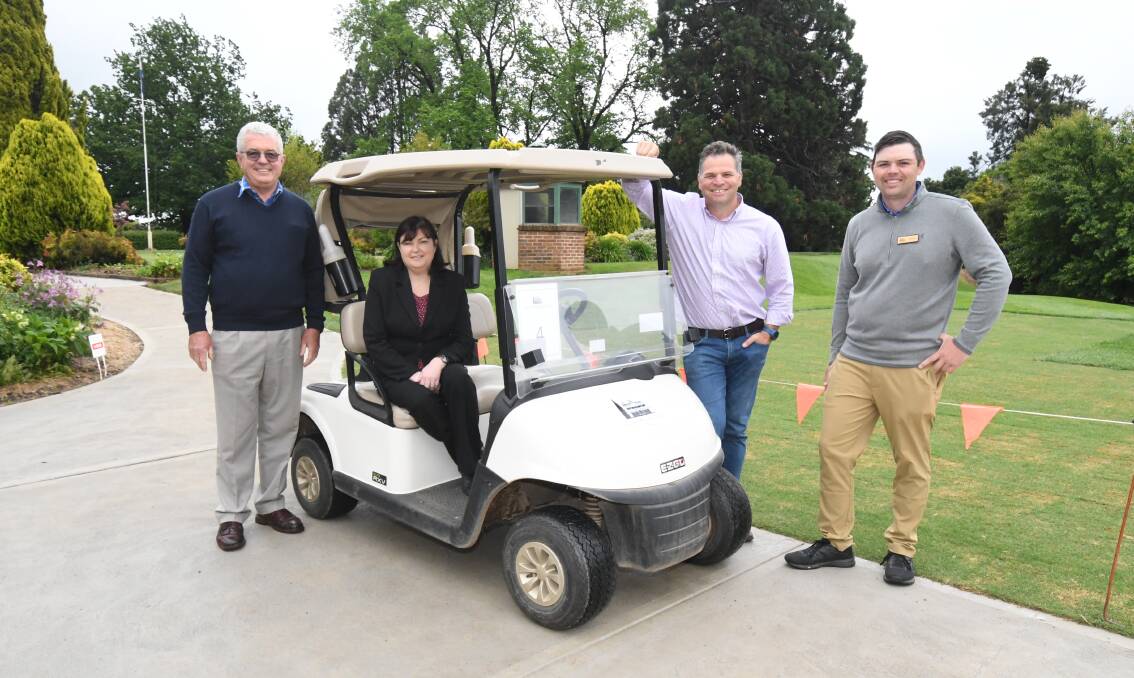 IMPROVEMENT: Duntryleague Golf Club president John Cook with Michelle Carroll, Orange MP Phil Donato and Nathan King. Photo: JUDE KEOGH