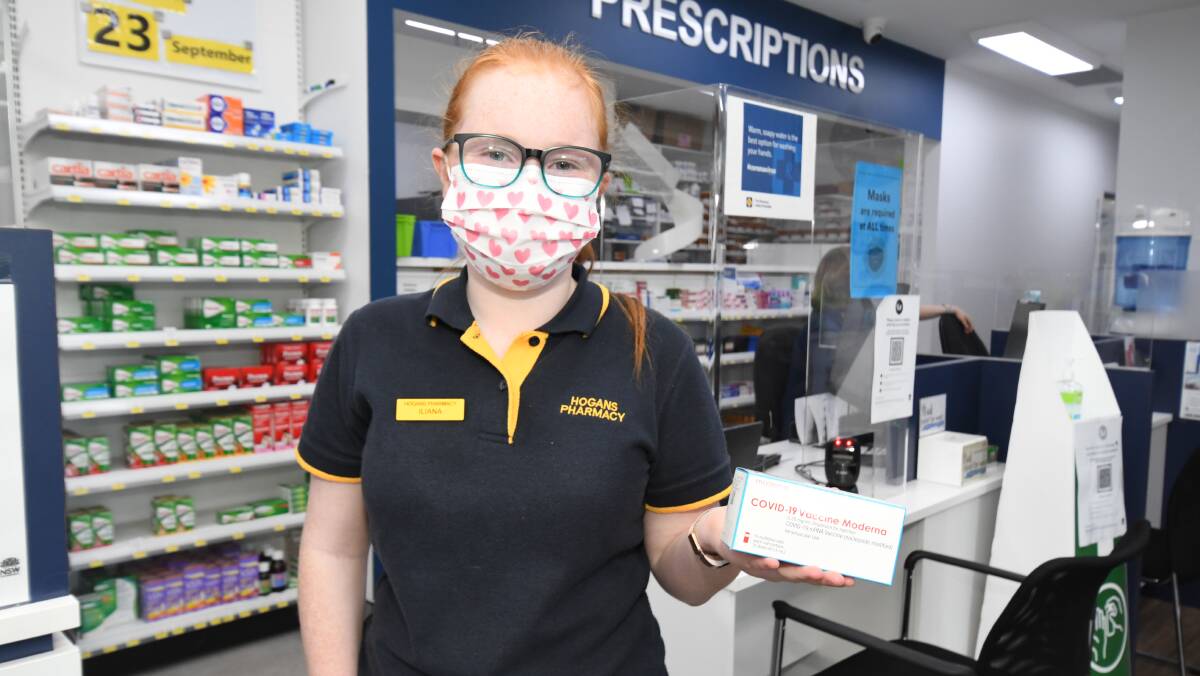 GET VAXXED: Hogan's Pharmacy assistant Iliana Peter with some of the Moderna vaccine which is the first to start arriving in Orange. PHOTO: JUDE KEOGH