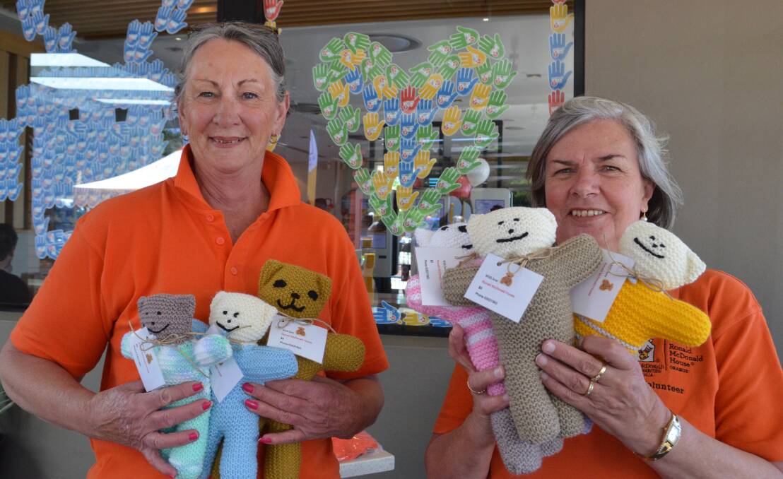 FOR THE KIDS: RMHC Orange volunteers Lesley Brown and Barbara Bloomfield with the teddies sold at McHappy Day. PHOTO: ALANA CALVERT