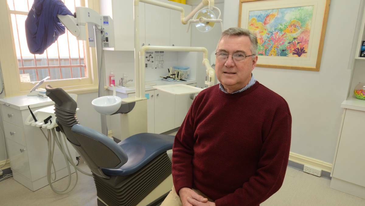 HIGH PRICE: Orange-based dentist Dr Tim McAnulty is urging parents to utilise the dental scheme available to children . PHOTO: JUDE KEOGH