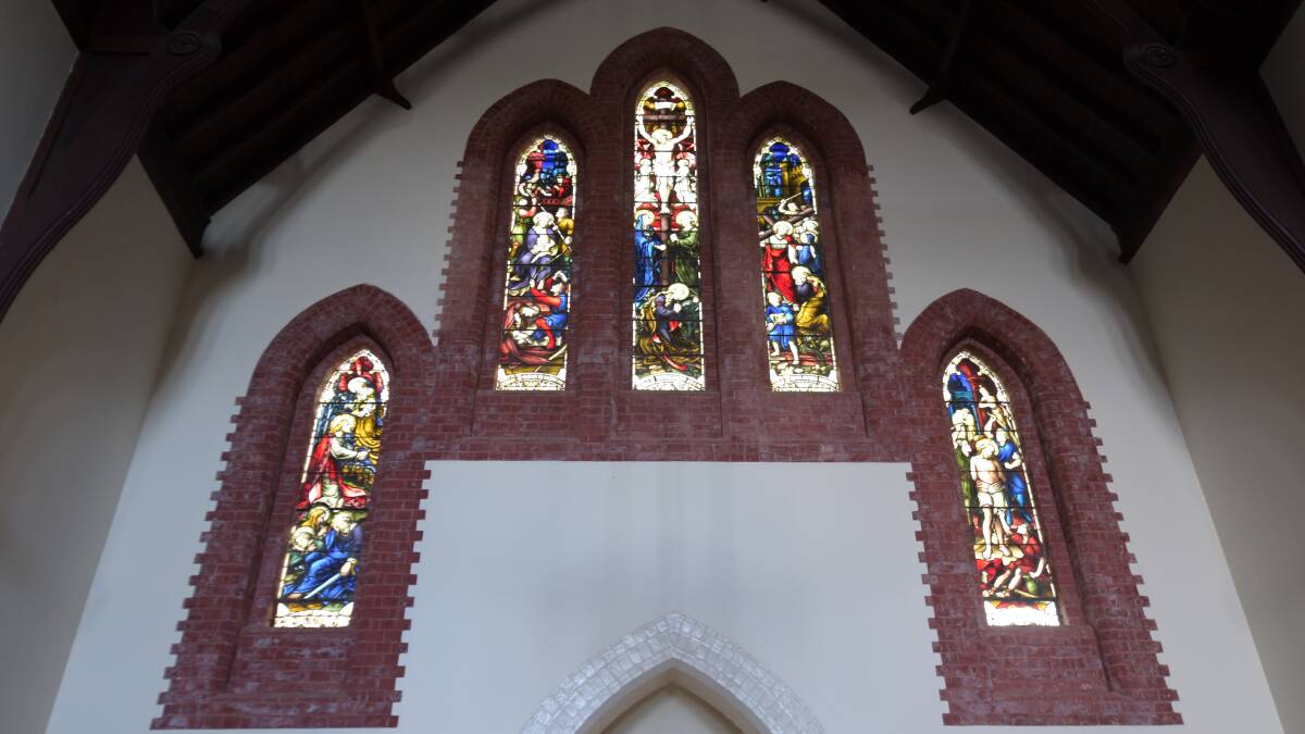 HISTORIC: The century-old, very rare and valuable stained-glass windows of St Joseph's church have been removed for the first time. PHOTO: CARLA FREEDMAN