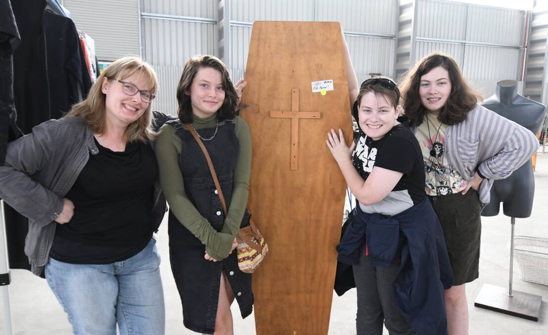 ONLY ONE OWNER: Mary Gallagher, Orlagh Fock, Evie Fock and Isabella Fock with the 'coffin' purchased at the garage sale. PHOTO: JUDE KEOGH 