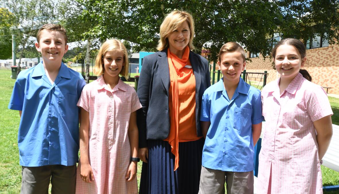 St Mary's Catholic Primary School's new principal Gayle Stratton with student leaders William Pell, Phoebe Johnston, Harry Miller and Macey Thomas. PHOTO: JUDE KEOGH