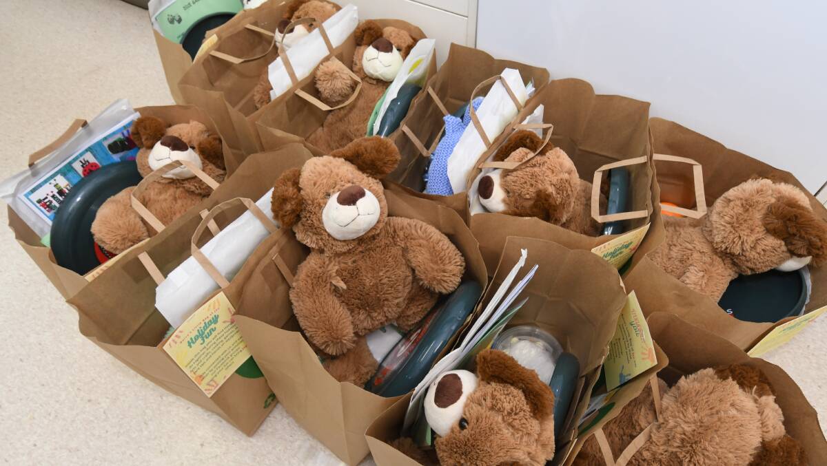 The school holiday packs of donated items for children. PHOTO: JUDE KEOGH