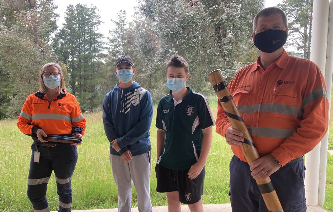 DONATION: Bridgette Byrne (Cadia) with students Jaroem Ah-See and Jayden Kemp and Aaron Brannigan (Cadia General Manager). PHOTO: SUPPLIED