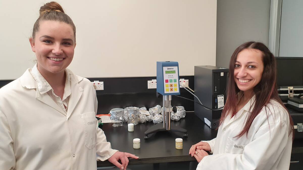 INVENTIVE: Charles Sturt University pharmacy students Mollie Gersbach and Haidy Ibrahim at work in the lab. PHOTO: SUPPLIED