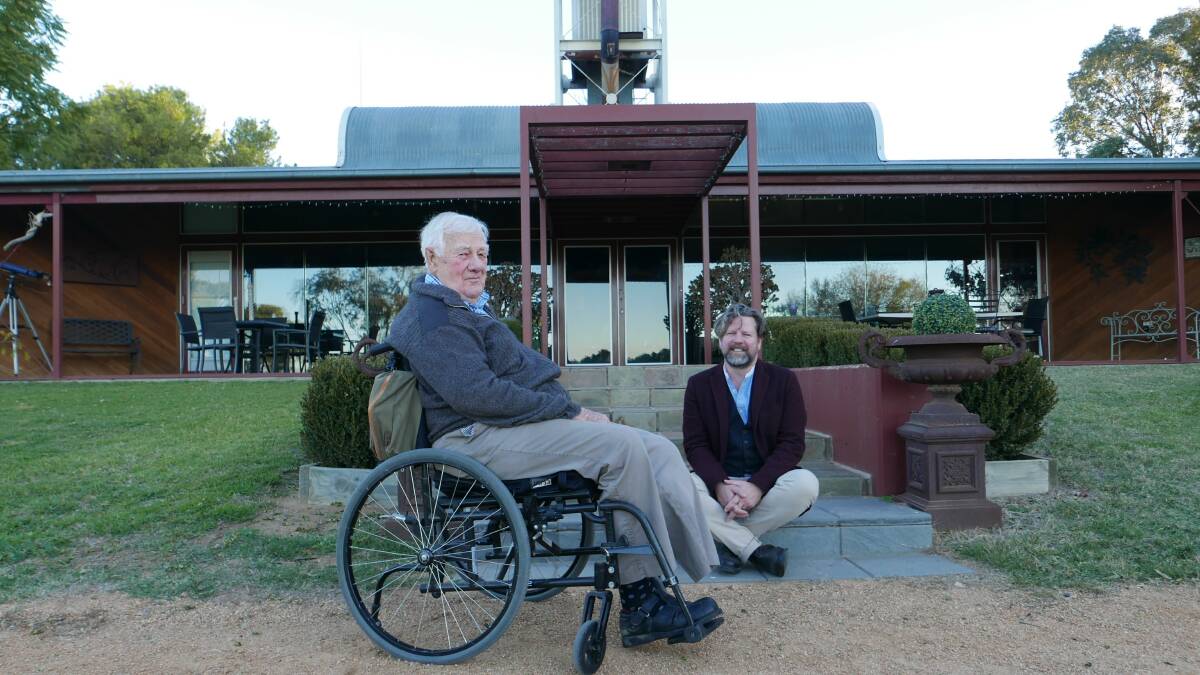 HOME FOR THE AGES: Acclaimed architect John Andrews with Tim Ross in front of the Eugowra farmhouse he designed in the 1980s for his family. PHOTO: ABC/DESIGNING A LEGACY