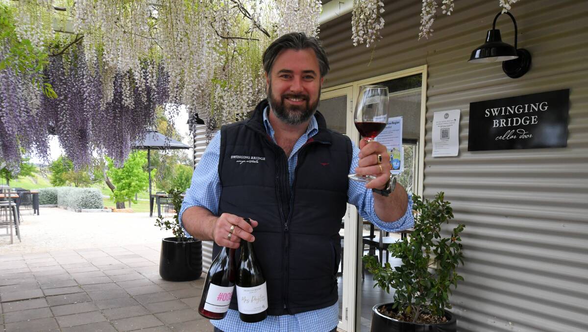 COME OUT, WE'RE OPEN: Swinging Bridge Wines event coordinator Jay Byrnes is looking forward to a busy weekend with the cellar door planning a Live in the Vines event this Saturday. PHOTO: CARLA FREEDMAN 