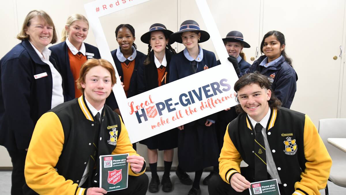 SHIELD APPEAL: Kate Young from the Salvation Army with volunteer collectors Lily Martin, Callan Arden, Candice Namenda, Charli Hobbs, Amber Glanford, Rebecca Kemp, Khushi Patel and Callum Johnson. PHOTO: CARLA FREEDMAN