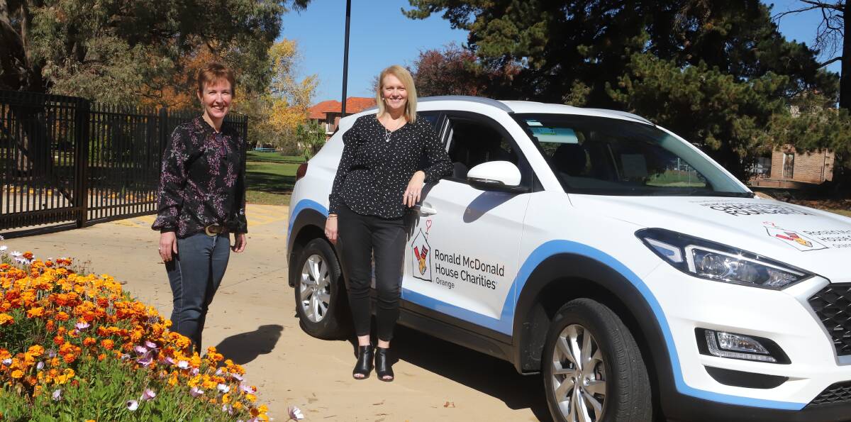CHARITY GRANT: Rebecca Walsh and Bronwyn Cooper of Ronald McDonald House Charities Orange which received $25,000 last year to purchase a car. Photo: CARLA FREEDMAN