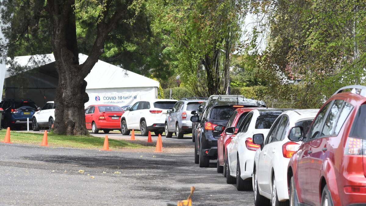 GET TESTED: There were long queues for testing at Wade Park yesterday following news that two childcare centres and a community centre had been visited by COVID-positive Council worker. PHOTO: CARLA FREEDMAN 