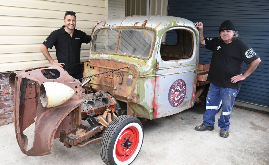 SELL, BUY, SWAP: : Adam Scimone and George Georgiou with his 1936 Rat Rod pick-up truck which he will be bringing along. PHOTO: JUDE KEOGH 