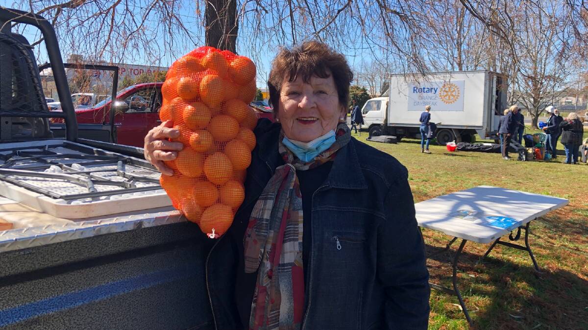 ALL SMILES: Condobolin fruit producer Ruth Crompton (of Condo Oranges) completely sold out of oranges, limes and mandarins at Saturday's Farmers' Market. PHOTO: ALANA CALVERT