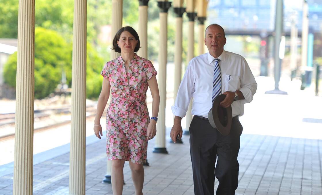 VISIT: Then Transport minister Gladys Berejiklian and then Member for Wagga Daryl Maguire visit Wagga Railway Station in 2015.