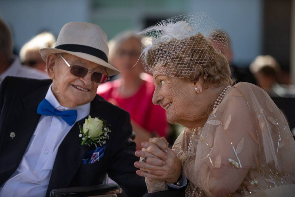 LOOK OF LOVE: Newlyweds Ron Hedley and Marie Hill at the commitment ceremony in their Cameron Park aged care facility. Picture: Marina Neil