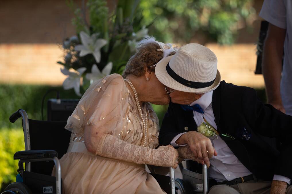 A kiss for the newlyweds. Picture: Marina Neil