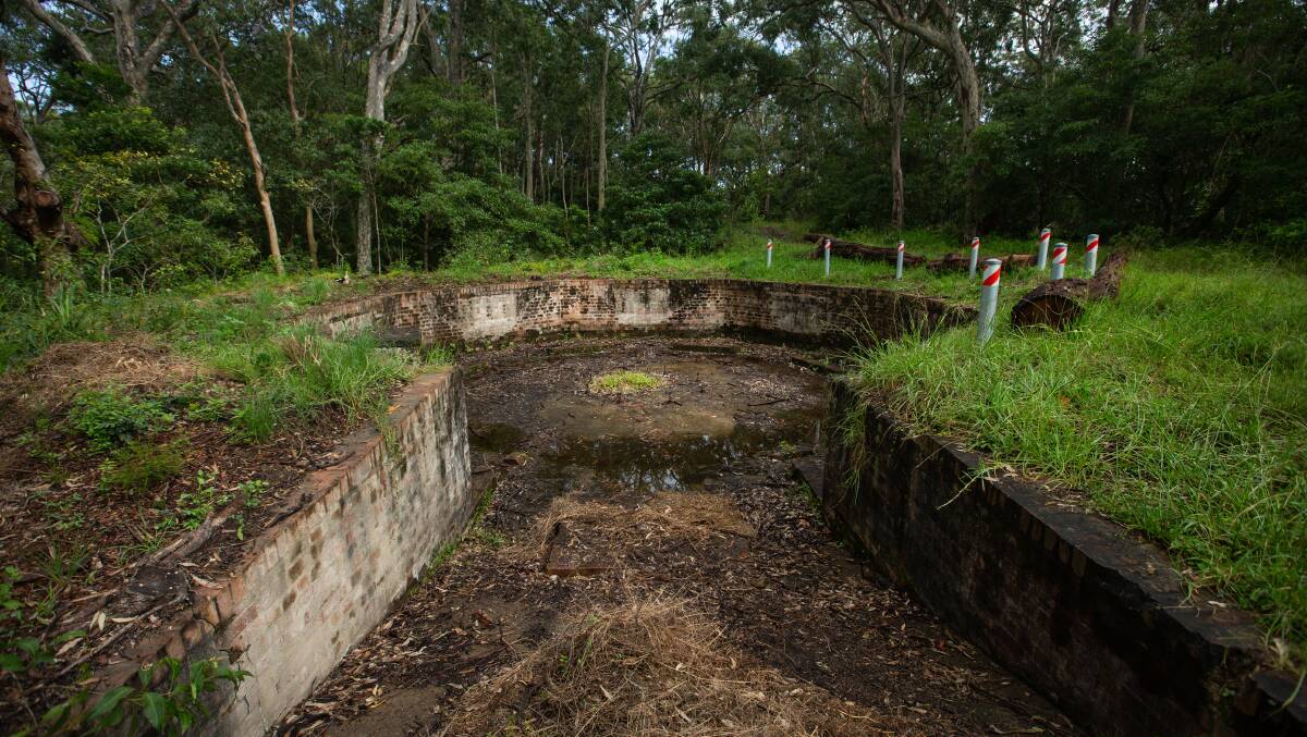 HISTORY: One of the four structures in which anti-aircraft guns were installed on the ridge at Wangi Point.