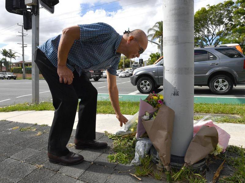 Two pedestrians were killed when they were hit by stolen Landcruiser in Brisbane.