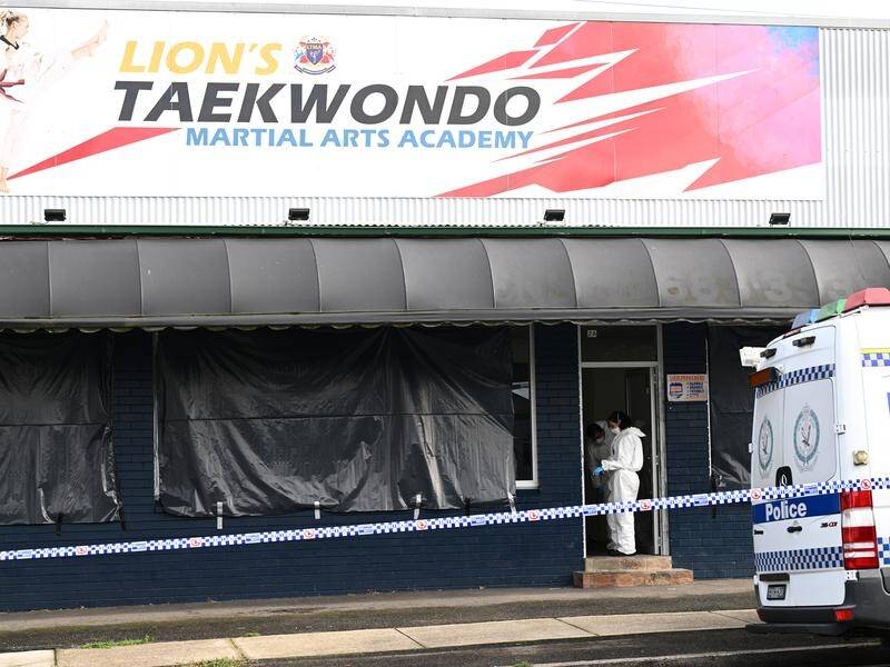 Forensic officers have combed a taekwondo studio and a home in Sydney after three bodies were found. (Dan Himbrechts/AAP PHOTOS)