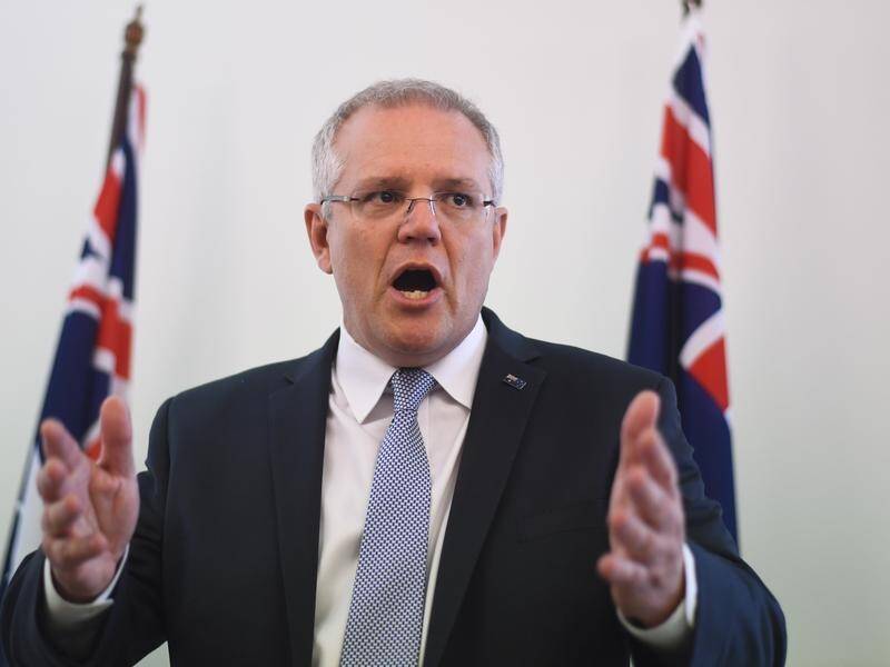 Prime Minister Scott Morrison has told a partyroom meeting 'We have a mountain to climb together'.