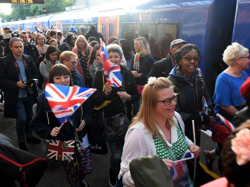 Royal fans have been cramming into trains to get to Windsor for Prince Harry's wedding.