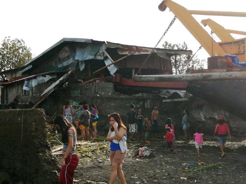 At least 20 people are dead in the Philippines after Typhoon Phanfone made landfall.