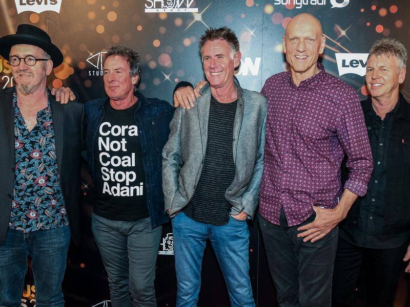 Midnight Oil are in talks for another album after collecting a gong at this week's APRA Awards.