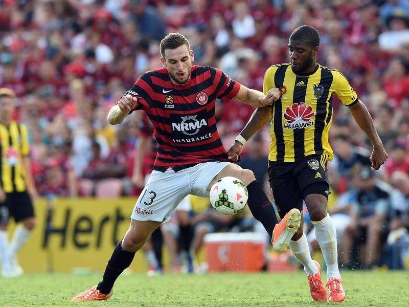Matthew Spiranovic (left) is set to join his former Wanderers' coach Tony Popovic at Perth Glory.