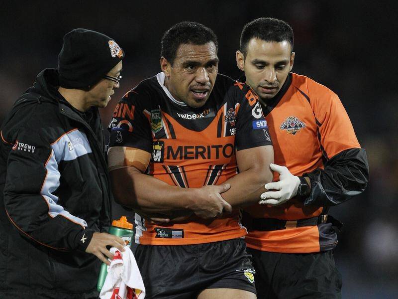 Ex-West Tigers and Penrith Panthers NRL player Masada Iosefa (c) has died in a quadbike accident.
