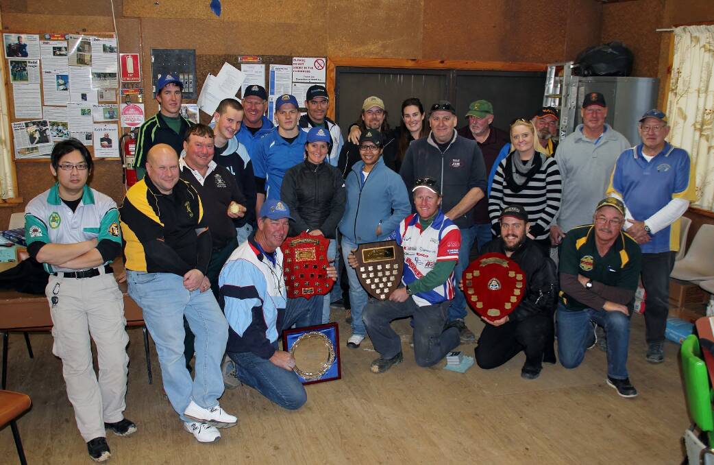 GUN SHY: Competitors after the presentation of the weekend's NSWAPA WA1500 and Service Pistol State Championships.