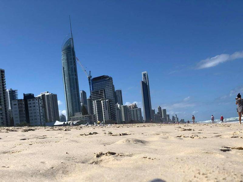Surfers Paradise Beach has been closed as southeast Queensland braces for more wild weather.